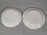 two plates that are sitting on a table