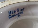 a close up of a bowl with writing on it