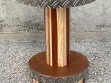 an image of a wooden table with a metal plate on it