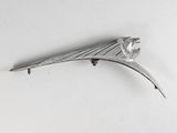 a silver hair clip with a bird on it