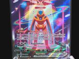 a close up of a pokemon card on a black background