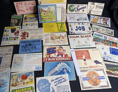 many different types of advertising posters on the table