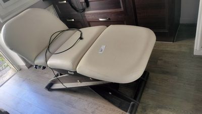 a chair that is sitting on a table in a room