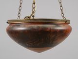an image of a hanging light fixture with a tree design on it