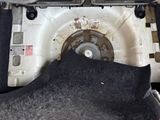 a close up of a dirty toilet with a black cloth