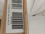 a box with a barcode on it sitting on a bed