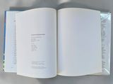 an open book that is sitting on a table