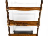 an image of a wooden shelf with three shelves on top of it