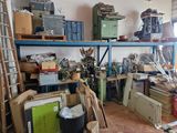 a room filled with lots of clutter and tools