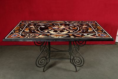 an image of a table with a tile top on it