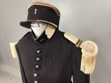 an image of a military uniform with a hat and a cane