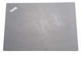 an image of a gray mouse pad on a white surface
