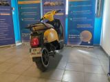 a scooter that is parked inside of a building