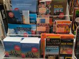 a lot of books that are on display in a store