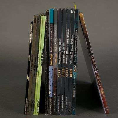 books stacked on top of each other with a pencil sticking out of them