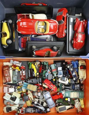 many different types of toy cars in a box