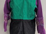 a close up of a mannequin wearing a green and purple jacket