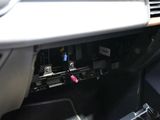 the interior of a car with a dash panel and a dash light