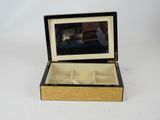 a box with a picture of a cat inside of it