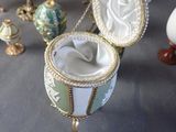 a small box with a picture of a woman inside of it