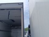 an image of a truck that is parked on the side of the road
