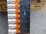 an image of a couple of orange and black screwdrivers in a package