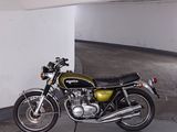 a motorcycle that is parked in a parking garage