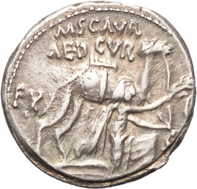 une pièce d'argent portant l'image d'un homme