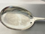 a spoon that is sitting on a table