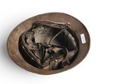 a brown hat with a baseball glove inside of it