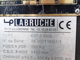 a close up of a metal sign on a metal surface