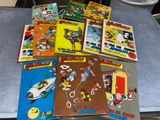 a lot of comic books on the table