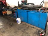an image of a car being worked on in a garage