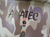 a close up of a motorcycle with a camo design on it