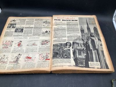 an old book that is open on a table