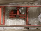 a picture of a box with a forklift inside of it