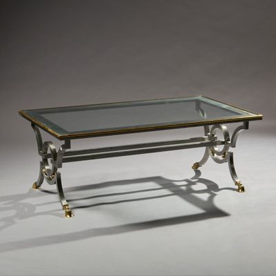 Maison JANSEN. Table basse rectangulaire en acier brossé, le… - Photo 1