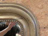 a man that is standing in front of a mirror