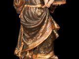an image of a statue of a woman holding a baby