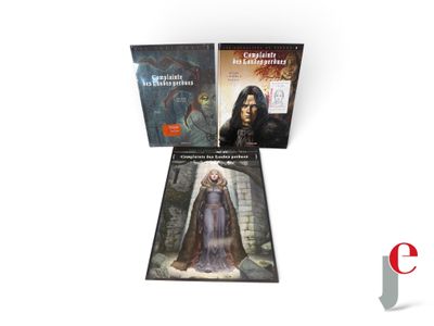 three books on a white surface with a white background