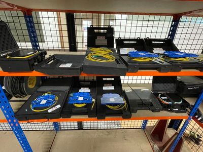 a rack with many different types of electronics on it