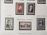 an image of a sheet of stamps with a picture of people on them