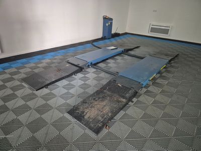 an image of a room that has been painted with blue tape