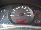 a close up of a speedometer in a car