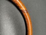 an image of a close up of a wooden ring on a table