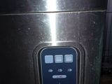 an image of a commercial ice cream maker in a kitchen