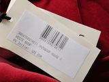 a label on a piece of clothing that has a barcode on it