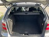 the back end of a car with the trunk open