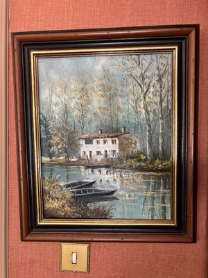 une image d'un tableau représentant un bateau sur l'eau