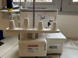 a machine that is sitting on a table in front of a window
